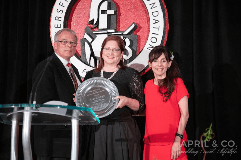 Sistrunk accepts the Corporate Philanthropist of the Year Award from Bakersfield College Foundation Executive Director Tom Gelder and Bakersfield College President Dr. Sonya Christian. Photo courtesy of April Massirio