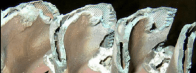 Type I corrosion attack on turbine blade aero foils and blade tips.