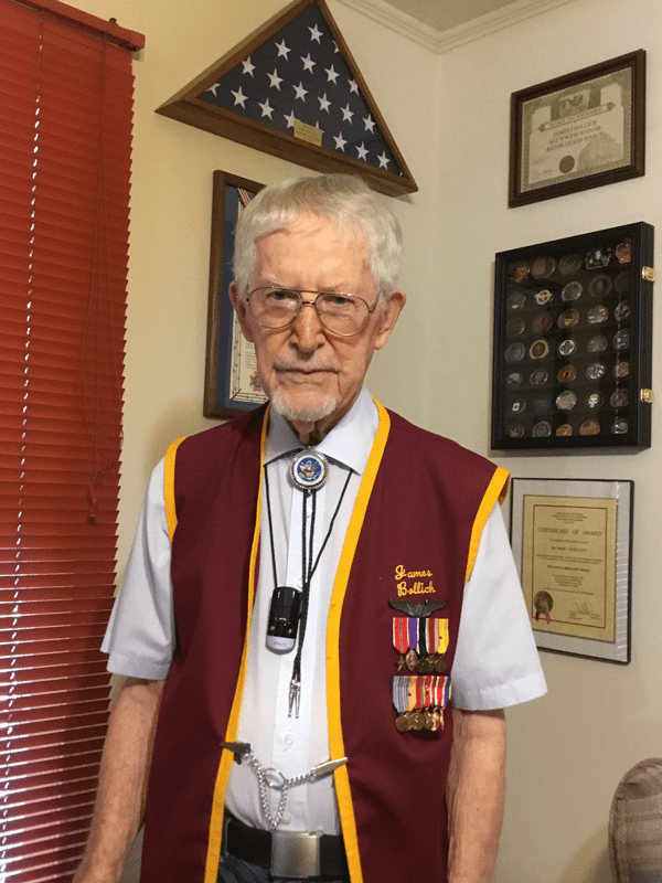 Decorated World War II Army veteran, James Bollich, shown wearing his medals, including the Purple Heart.